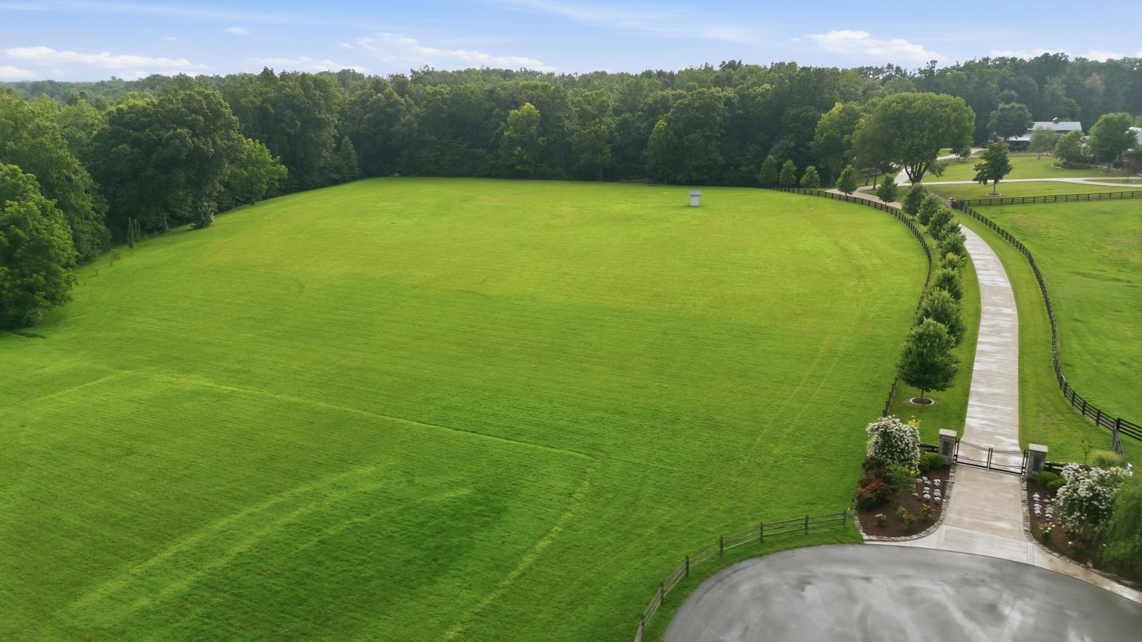 Open pasture and mature woods on acreage in Williamson County near Leiper's Fork
