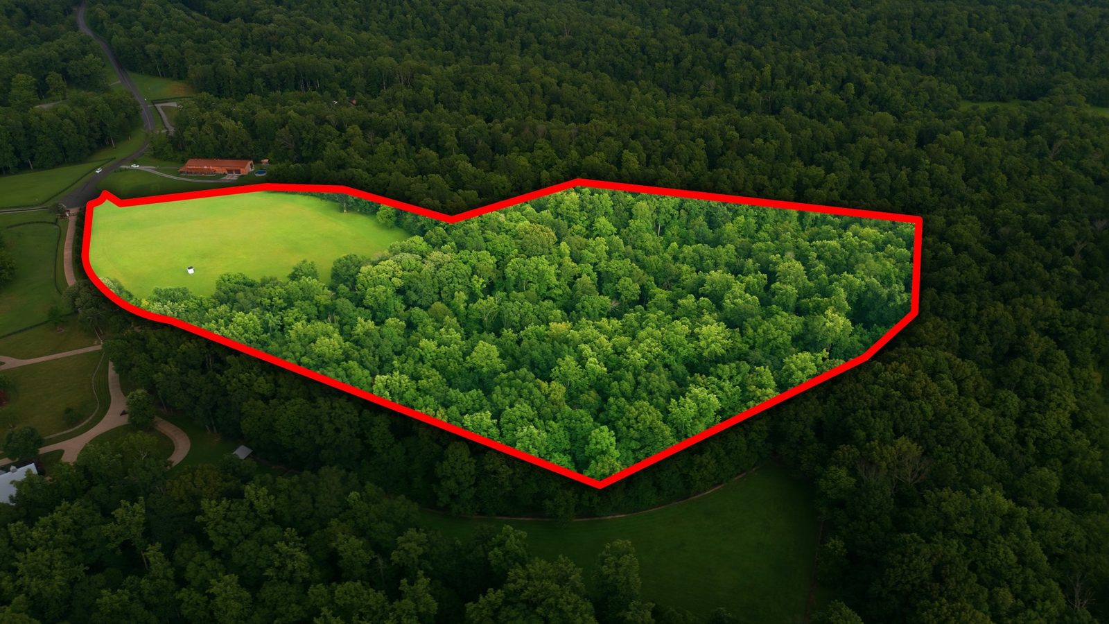 Aerial with the property boundaries outlined across the pasture and woodland