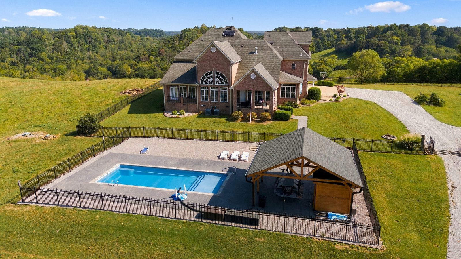 Another view of the home and grounds along the ridge